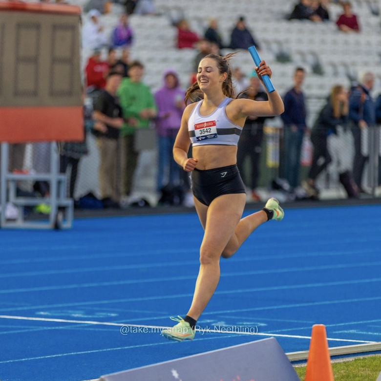 Photo of Speed Demon Coaching Client Scarlett Running The 4x400m